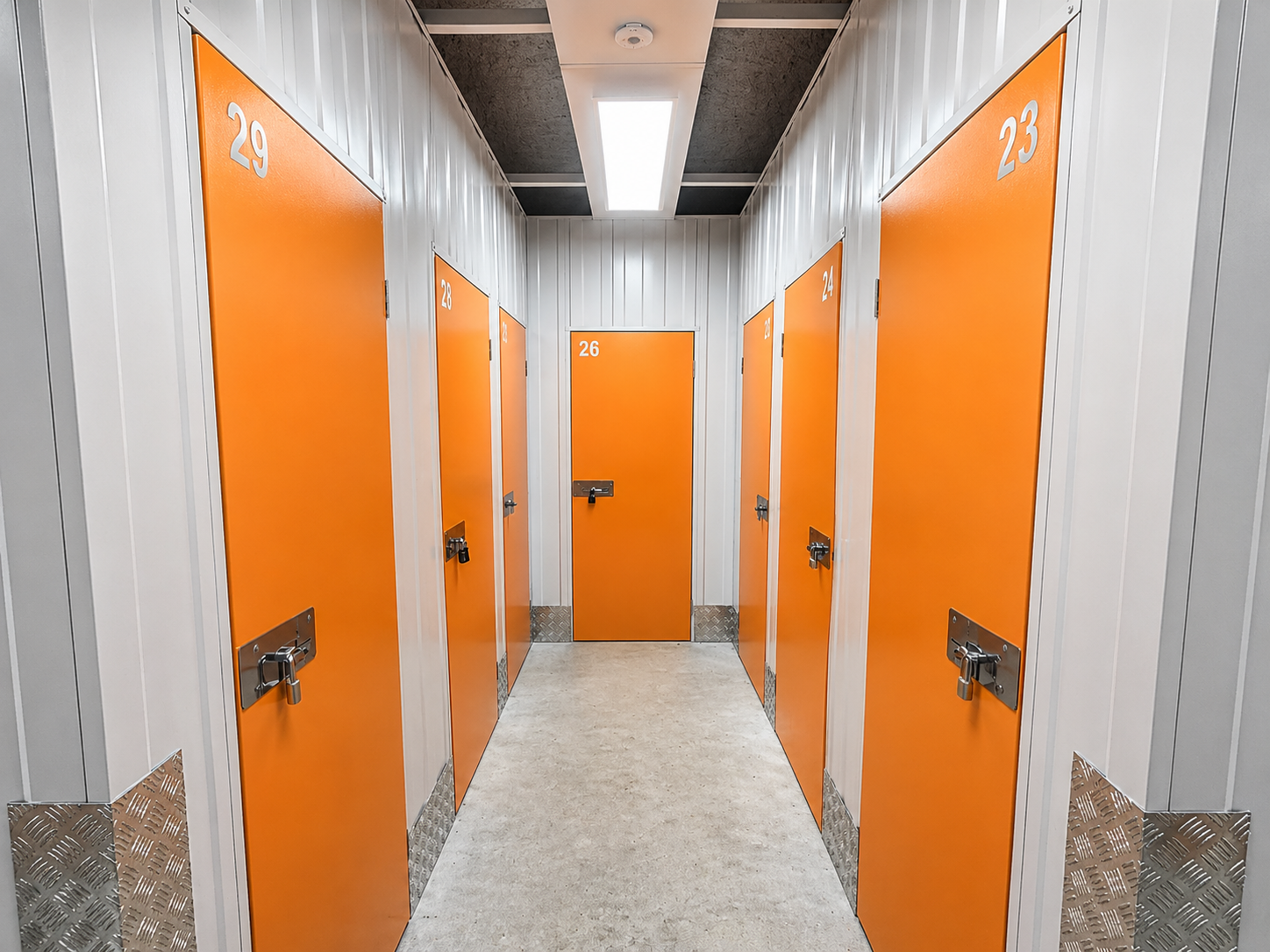 Interior hallway of WARDA with numbered orange doors
